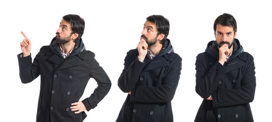 Man thinking over white background