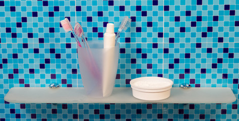 Tube of toothpaste and toothbrushes