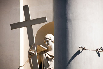 Angel, cross and security cameras