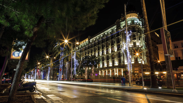 Cannes city by night with luxury hotels