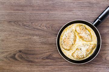 Chicken breast in cream sauce.