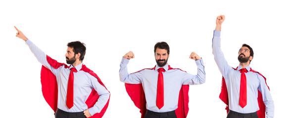 Businessman dressed like superhero with thumb up