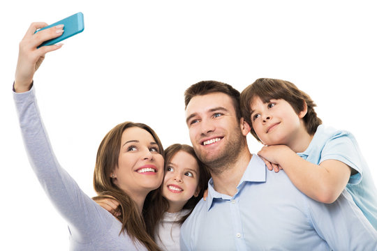 Family taking photo of themselves 
