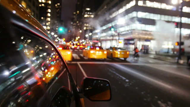 Yellow cabs driving in Manhattan