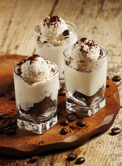 Tasty dessert with ice cream, chocolate and coffee, selective fo