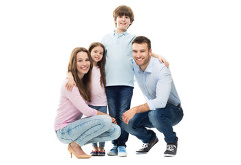 Obraz na płótnie Canvas Young family with two kids
