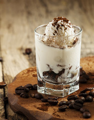 Tasty dessert with ice cream, chocolate and coffee, selective fo