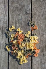 Pasta on a wooden board rough.