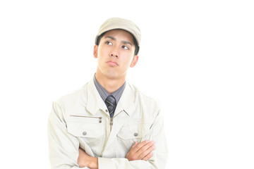 苦悩する作業員