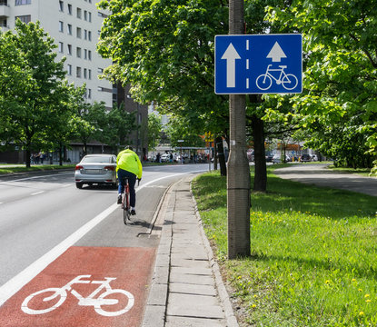 Fototapeta Bicycle path, cyclist, traffic lane - Red, white road marking