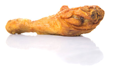 Deep fried chicken drumsticks over white background