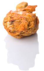 Deep fried chicken drumsticks over white background