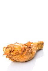 Deep fried chicken drumsticks over white background