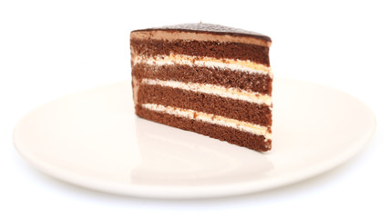 Beautiful tasty chocolate cake close up isolated on white backgr