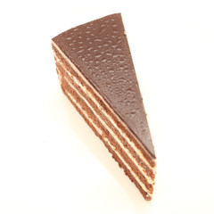 Beautiful tasty chocolate cake close up isolated on white backgr