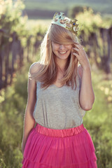 Blonde woman playing with here hair outdoor © Laszlo