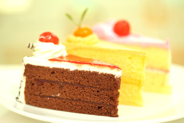 Beautiful tasty chocolate cake close up isolated on white backgr