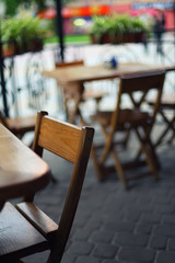 tables and chairs in the bar at shallow depth of field