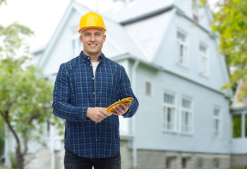 smiling man in helmet with gloves