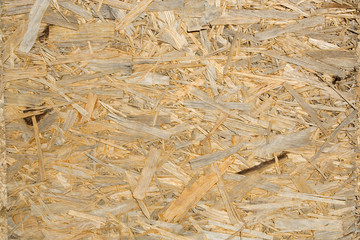 Pezzi di legno incollati su pannello