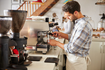Barista at work in a cafe