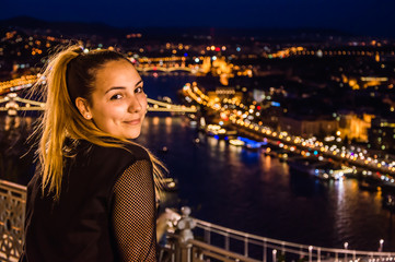 Beautiful girl in Budapest at night