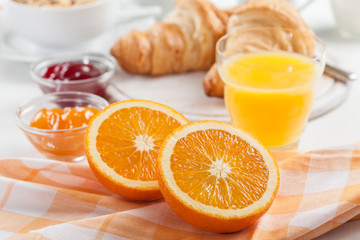 Fototapeta na wymiar Breakfast with fresh orange juice