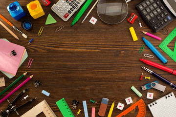 school supplies on wood