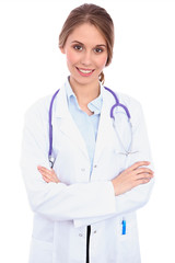 Fototapeta premium Friendly smiling young female doctor, isolated 