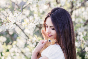 beautiful young women with rabbit