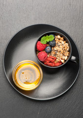 Granola , honey and berries. top view