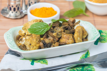 stew chicken in curry with mushrooms