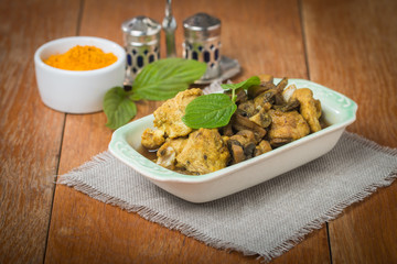 stew chicken in curry with mushrooms