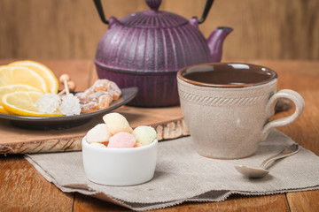 Tea with marmalade, chrystal sugar and lemon