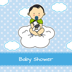 baby shower.Baby boy sitting on a cloud