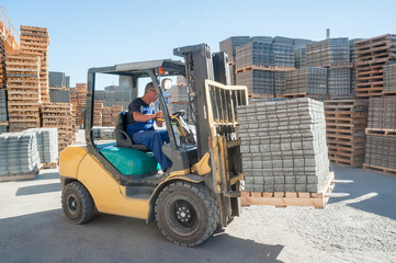 Loading footwalk products at construction factory