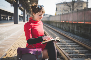 young beautiful red dressed vintage hipster woman