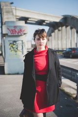 young beautiful red dressed vintage hipster woman