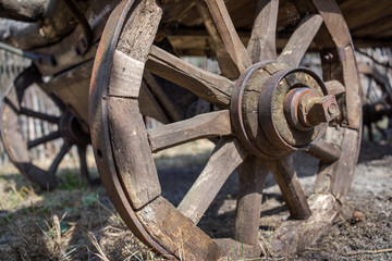 close up view of the old wooden telega standing in a countryside