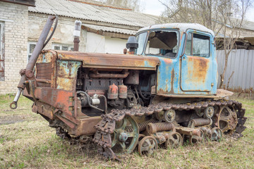 old rusty vintage abandoned tractor "Kazahstan" DT-75