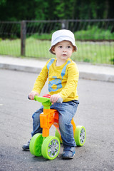 little boy on the color of bicycles