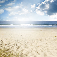 Fototapeta na wymiar Beach sand sea and sky