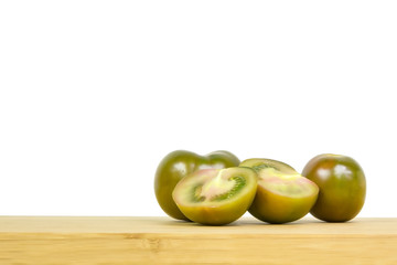Tomatoes on a wooden surface
