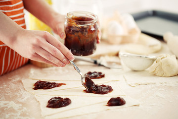Making croissant cookies.