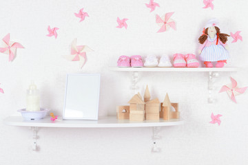 Baby accessories on shelves close-up