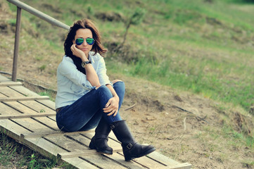 Beautiful woman in sunglasses outdoor fashion portrait