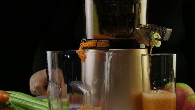 Process of extracting fresh juice from carrot apple and celery