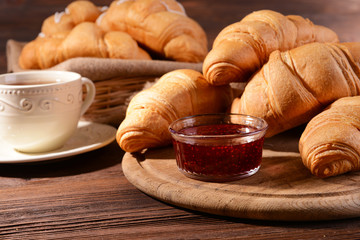 Delicious croissants on table close-up