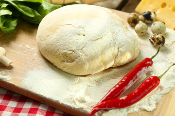 Food ingredients for pizza on table close up