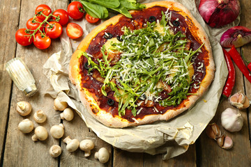 Tasty pizza with vegetables on table close up